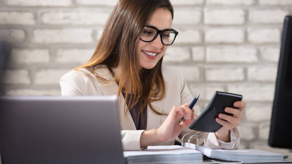 Expert forensic accountants analyzing financial data for fraud cases.